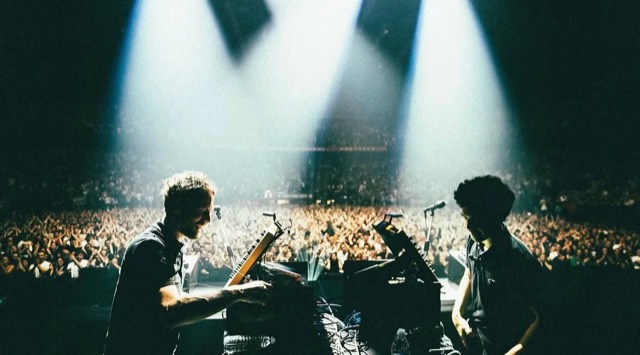 The Blaze performing for a large concert audience
